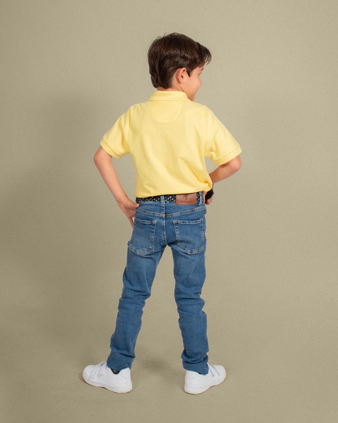 Camiseta polo pique algodón amarillo para niño